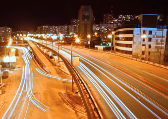 Fototapeta na wymiar night roads with running lights