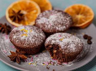 Chocolate muffins with orange peel