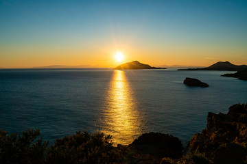 Sunset near scenic Aegean sea in Greece