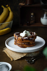 Toast with banana and curd cheese. A simple idea for breakfast.