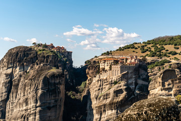 Fototapeta na wymiar orthodox monasteries on rock formations near mountains in meteora