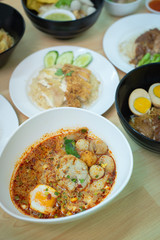 Top view composition with Thai Food. Chicken rice, Stewed pork leg on rice and noodle