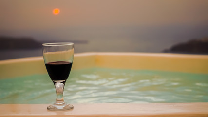 glass of wine on the beach