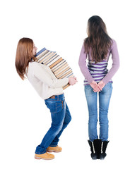 Back view of two woman in sweater.