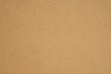 Texture of brown craft paper or kraft paper background.