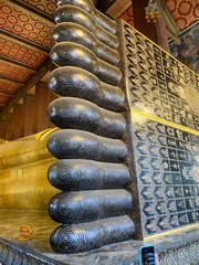 Reclining Buddha gold statue feet. Wat Pho, Bangkok, Thailand
