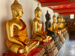 Buddha gold statues. Wat Pho, Bangkok, Thailand