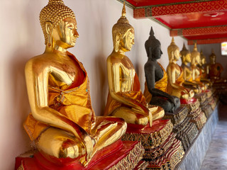 Buddha gold statues. Wat Pho, Bangkok, Thailand