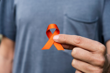 orange ribbon in support of multiple sclerosis