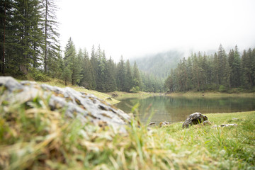 grüner See - green lake Austria with view and clear green water