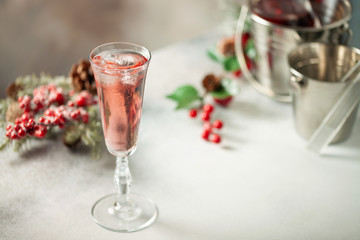 Two glasses of  champagne on light background. Festive drink. Valentins or Christmas concept.
