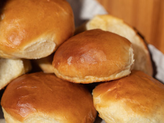 Fresh homemade buns in a basket. Homemade Brioche.