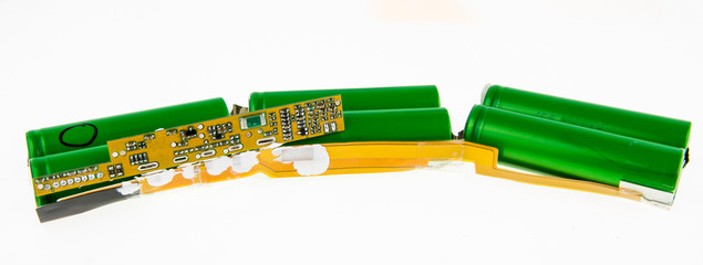 Disassembled laptop battery with charging and protective circuit.