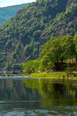 Obraz premium Mountain lake in summer time near Eidfjord, Norway