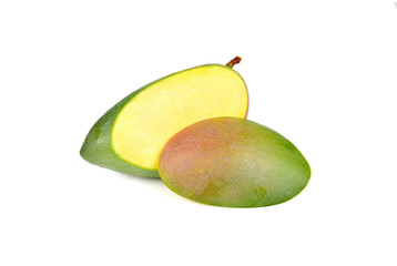 whole sliced raw mango with stem on white background