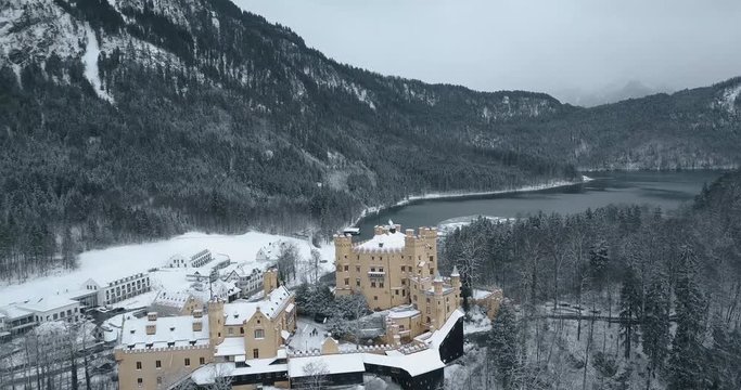 Hohenschwangau Castle in winter Aerial view landscape. Germany, Bavaria. Schwangau. Snowing. 4k video 24 fps. 19 marth, 2019. part5