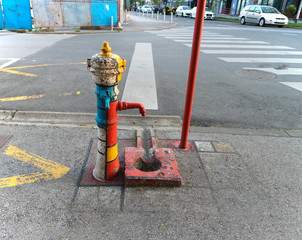 Zagreb/Croatia-April, 17th,2020: Old water pump painted as homage zo Piet Mondrian`s red, white,...