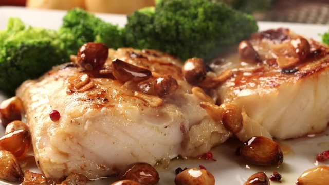 slide shot cod fish with smoke