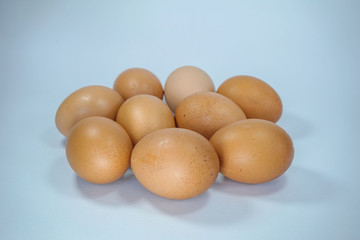 Fresh eggs on a white background