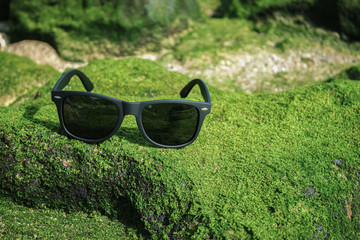 Sunglasses on the green grass