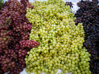 Green, red and purple grape fruit. Healthy and natural food.