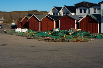 Fishing nets and trawls on the ground.