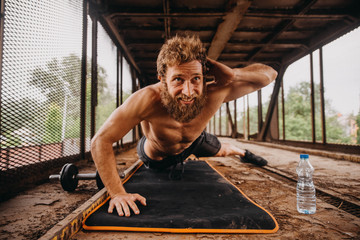 Man working out at old train station