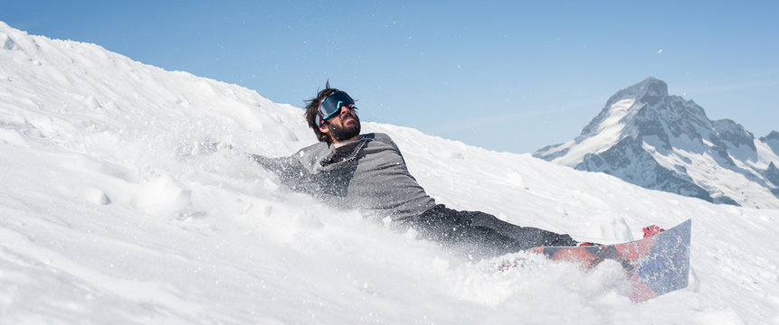 Freerider Snowboarder Drop Fall Down And Crash With His Snowboard On Extreme Gradient Downhill. Winter Mountain Freeride