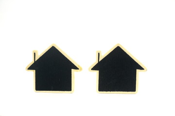 Two wooden house on a white ground