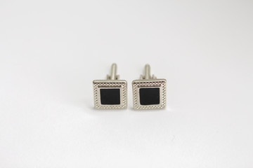 cufflinks on a white background