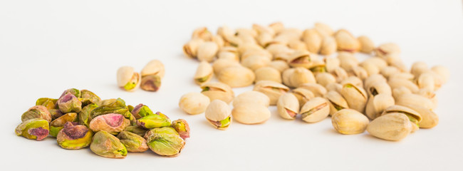 roasted pistachios on white background