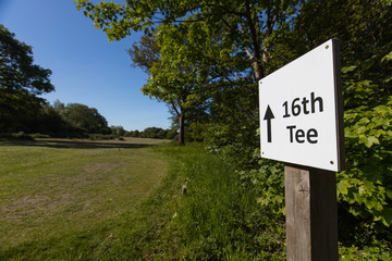 Golf Course Sign Pointing Towards Next Tee