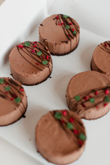 Chocolate brownies. The brownies are dark. The cakes are decorated. 