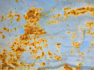 Blue corroded metal surface with spots of rust. Grunge metal background