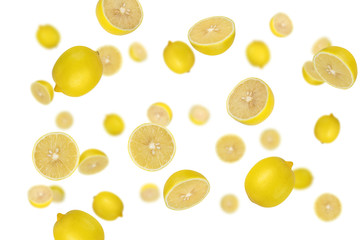 Falling lemons isolated on a white background with clipping path as package design element and advertising. Top view