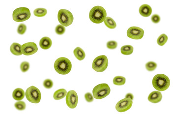 Falling kiwi slices isolated on a white background with clipping path as package design element and advertising.