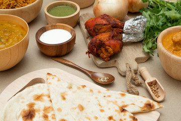 Indian food Tandoori chicken with Naan bread.