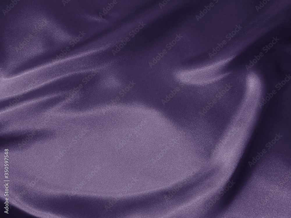 Wall mural shiny violet crumpled fabric background. liquid wavy shape.