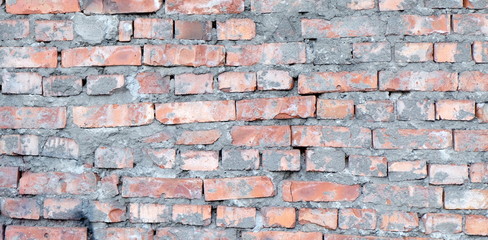 old textured red brick wall, close-up, background