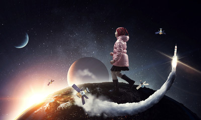 Obraz na płótnie Canvas A little girl walks on a beautiful full moon night.