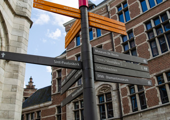 Fototapeta premium Antwerp, Flanders, Belgium. August 2019. Indicator signs of the main points of tourist interest: museums, squares and churches.