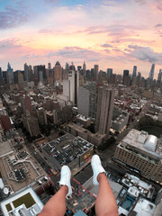 View of New York City, Manhattan, rooftopping from a building. Sat on the edge and watched sunset.