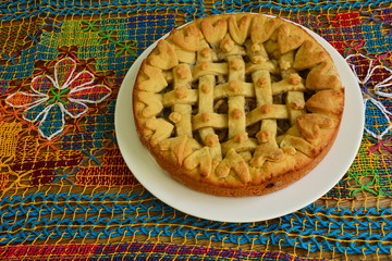 banana pie with coffee on the table