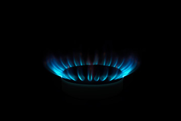 gas stove comfort with flame, on black background