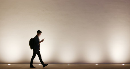 Fototapeta na wymiar silhouette of man use phone