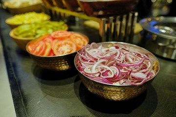 Various kinds of salads standing on the banquet table
