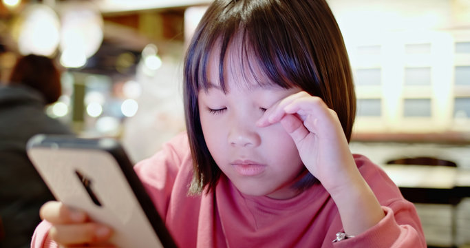 Asian girl use cell phone