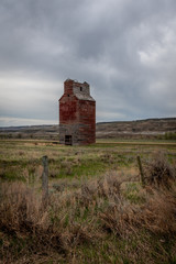 An old abandoned grain elevator in the badlands of Alberta.