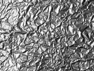 Wrinkled aluminum foil texture background