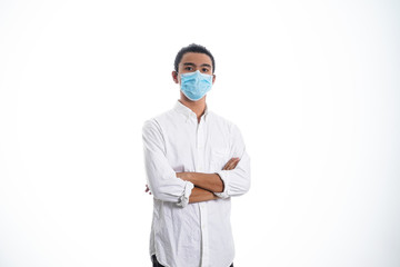 An Asian young man isolated on white background with casual entire and wearing a face mask. Hand gesture stop, sick, respect. during corona virus 